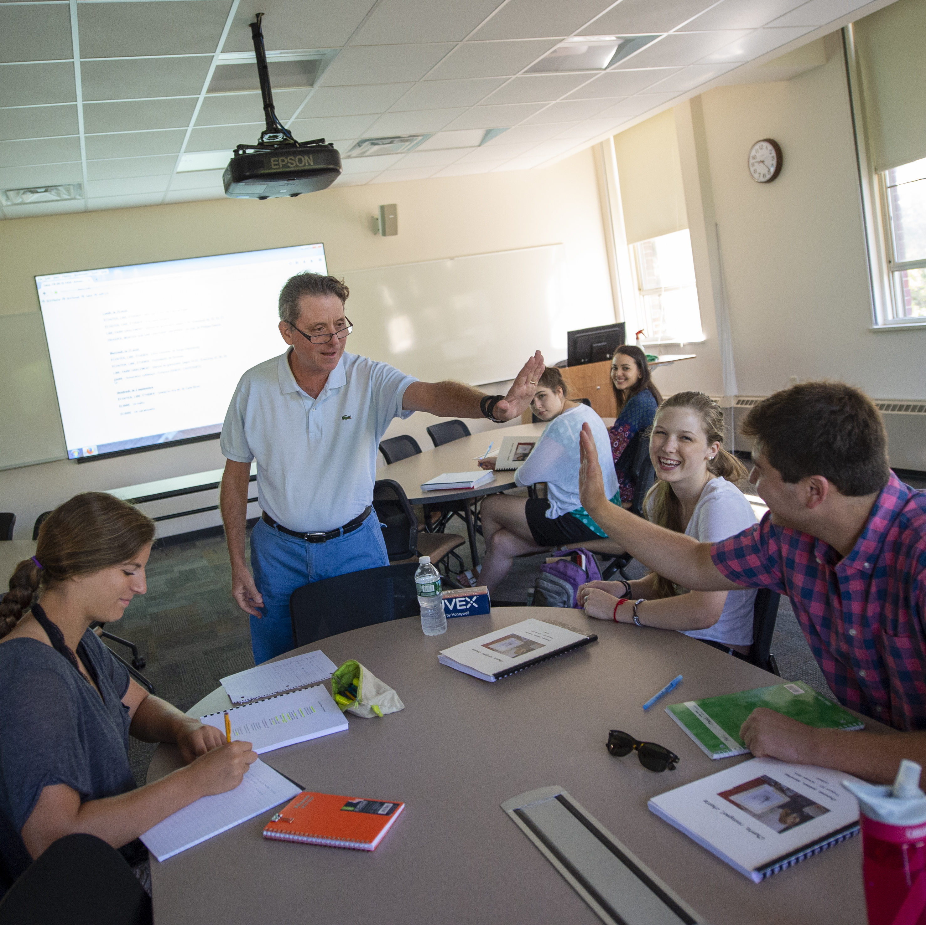 Faculty member with students